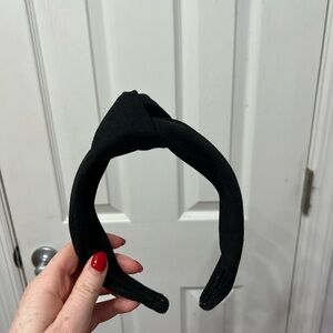 Black hard band headband with top knot